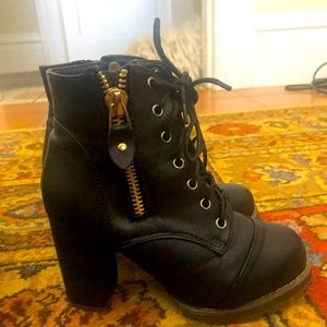 Black heeled combat boots